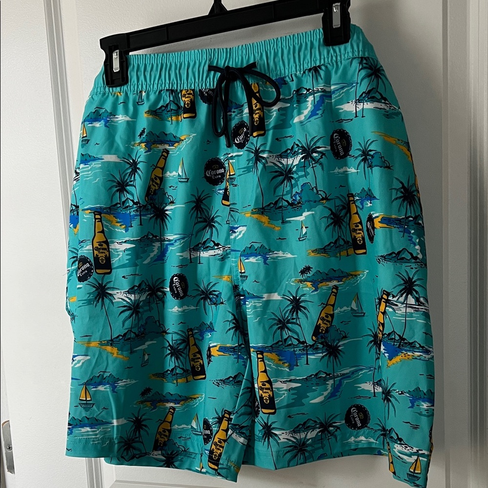 Men’s Corona Aqua and Yellow Tropical Swim Shorts
NWT Size 2 XL 44-46